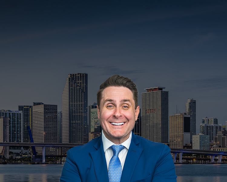 Jonathan Perazzo, Esq. with Atlanta skyline in the background